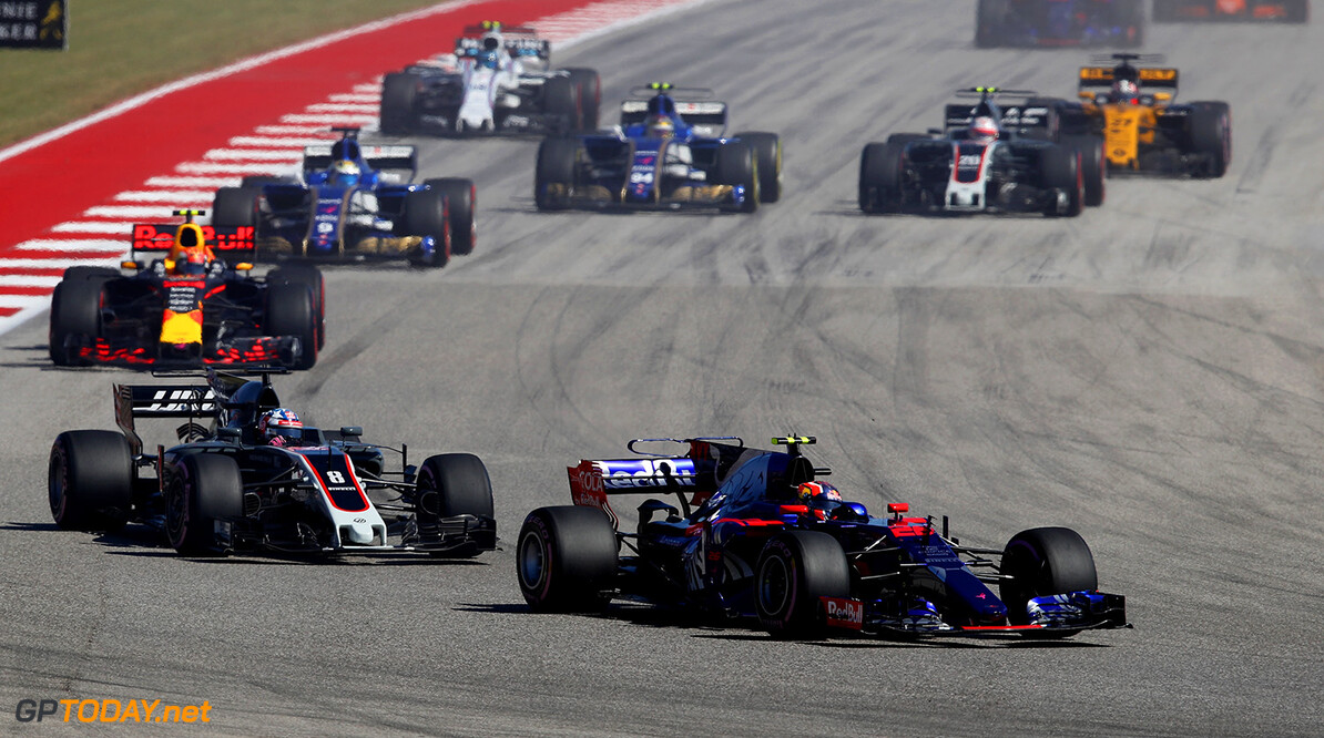 AUSTIN, TX - OCTOBER 22: Daniil Kvyat of Russia driving the (26) Scuderia Toro Rosso STR12 leads Romain Grosjean of France driving the (8) Haas F1 Team Haas-Ferrari VF-17 Ferrari on track during the United States Formula One Grand Prix at Circuit of The Americas on October 22, 2017 in Austin, Texas.  (Photo by Clive Mason/Getty Images) // Getty Images / Red Bull Content Pool  // P-20171022-01711 // Usage for editorial use only // Please go to www.redbullcontentpool.com for further information. // 
F1 Grand Prix of USA
Clive Mason
Austin
United States

P-20171022-01711