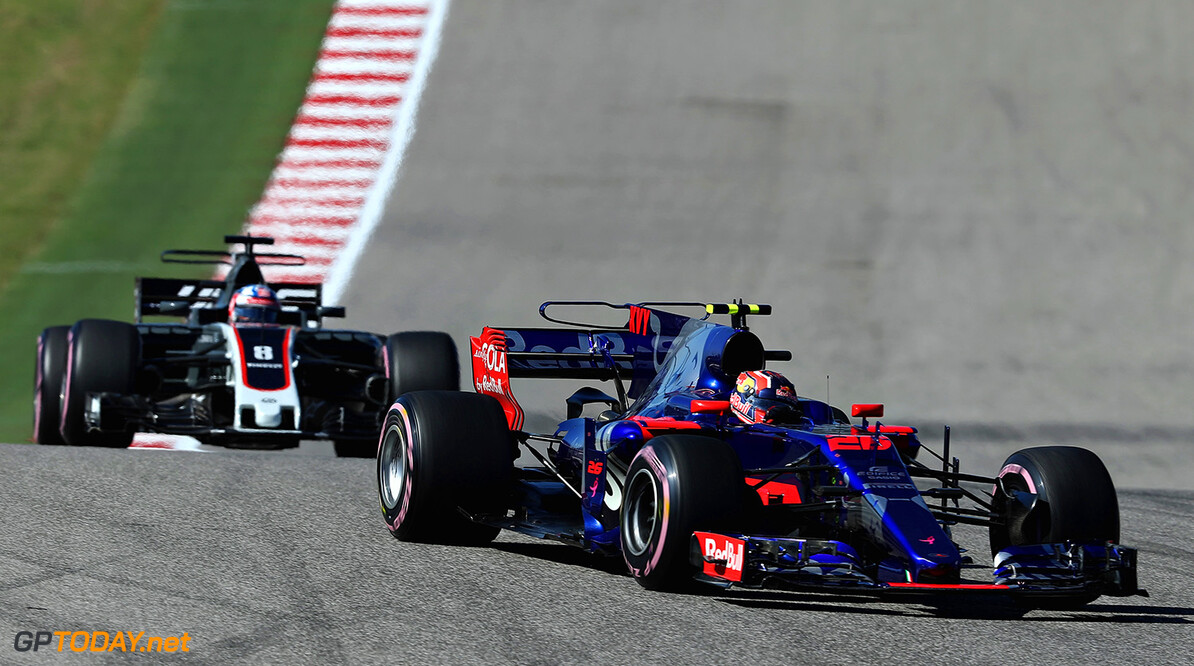 AUSTIN, TX - OCTOBER 22: Daniil Kvyat of Russia driving the (26) Scuderia Toro Rosso STR12 leads Romain Grosjean of France driving the (8) Haas F1 Team Haas-Ferrari VF-17 Ferrari during the United States Formula One Grand Prix at Circuit of The Americas on October 22, 2017 in Austin, Texas.  (Photo by Mark Thompson/Getty Images) // Getty Images / Red Bull Content Pool  // P-20171023-00190 // Usage for editorial use only // Please go to www.redbullcontentpool.com for further information. // 
F1 Grand Prix of USA
Mark Thompson
Austin
United States

P-20171023-00190