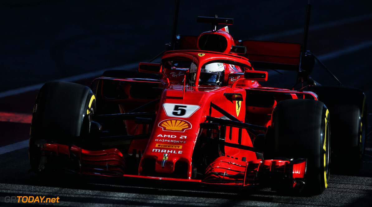 Vettel tops time sheets to begin second test