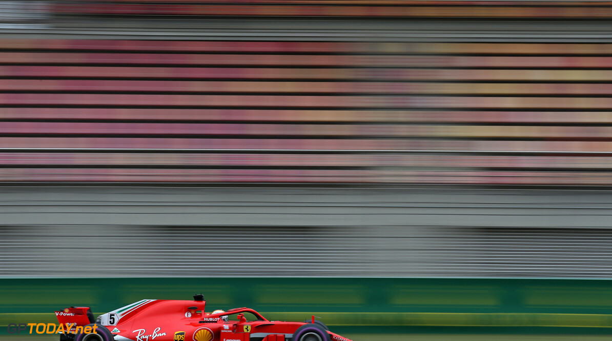 Vettel holds off Hamilton to take victory at Spa