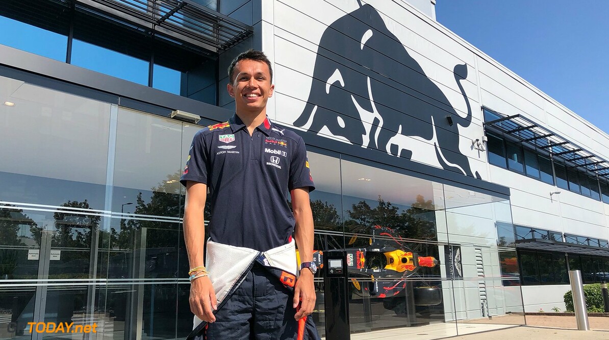 Albon poses in Red Bull attire ahead of the Belgian GP