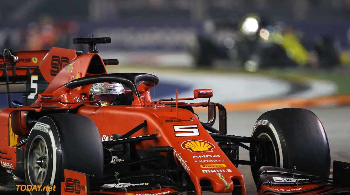 <strong>Singapore GP:</strong> Vettel ends win-less streak, leads Ferrari 1-2