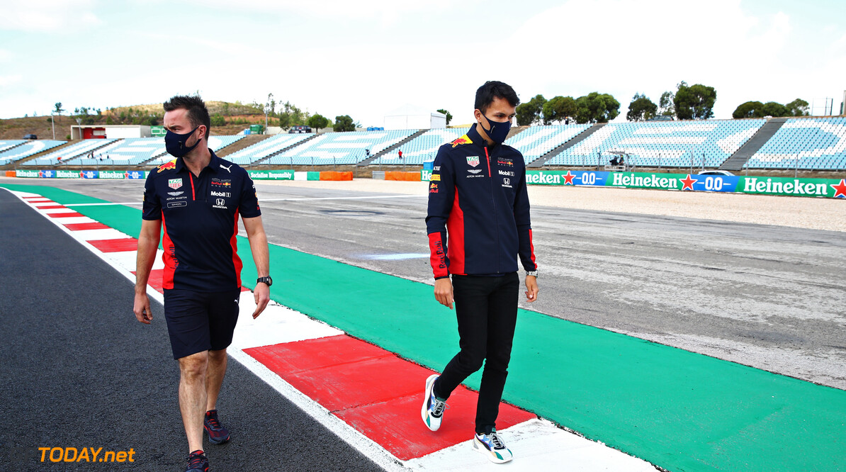 PORTIMAO, PORTUGAL - OCTOBER 22: Alexander Albon of Thailand and Red Bull Racing walks the track with his team during previews ahead of the F1 Grand Prix of Portugal at Autodromo Internacional do Algarve on October 22, 2020 in Portimao, Portugal. (Photo by Mark Thompson/Getty Images) // Getty Images / Red Bull Content Pool  // SI202010220183 // Usage for editorial use only // 
F1 Grand Prix of Portugal - Previews




SI202010220183