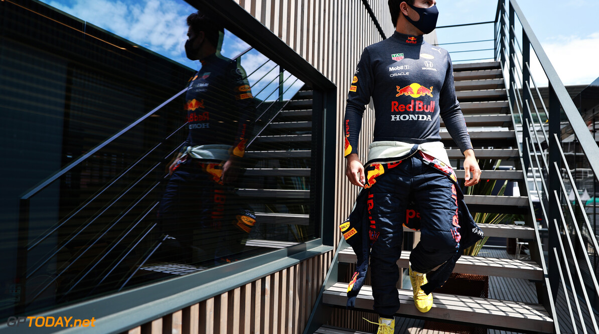 BARCELONA, SPAIN - MAY 07: Sergio Perez of Mexico and Red Bull Racing walks to the garage during practice for the F1 Grand Prix of Spain at Circuit de Barcelona-Catalunya on May 07, 2021 in Barcelona, Spain. (Photo by Mark Thompson/Getty Images,) // Getty Images / Red Bull Content Pool  // SI202105070230 // Usage for editorial use only // 
F1 Grand Prix of Spain - Practice




SI202105070230