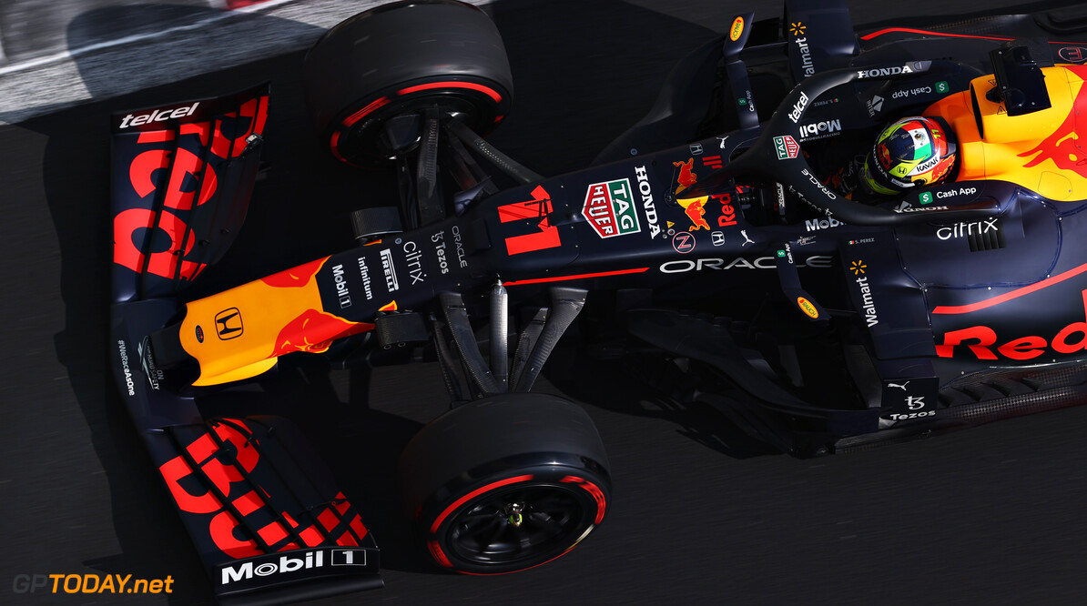 ABU DHABI, UNITED ARAB EMIRATES - DECEMBER 15: Sergio Perez of Mexico driving the (11) Red Bull Racing RB16B Honda during Formula 1 testing at Yas Marina Circuit on December 15, 2021 in Abu Dhabi, United Arab Emirates. (Photo by Clive Rose/Getty Images) // Getty Images / Red Bull Content Pool  // SI202112150262 // Usage for editorial use only // 
Formula 1 Testing in Abu Dhabi - Day Two




SI202112150262