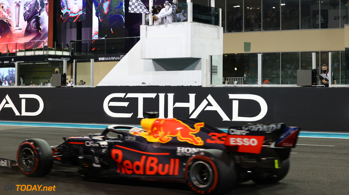 ABU DHABI, UNITED ARAB EMIRATES - DECEMBER 12: Race winner Max Verstappen of the Netherlands driving the (33) Red Bull Racing RB16B Honda takes the chequered flag during the F1 Grand Prix of Abu Dhabi at Yas Marina Circuit on December 12, 2021 in Abu Dhabi, United Arab Emirates. (Photo by Bryn Lennon/Getty Images) // Getty Images / Red Bull Content Pool  // SI202112120536 // Usage for editorial use only // 
F1 Grand Prix of Abu Dhabi




SI202112120536