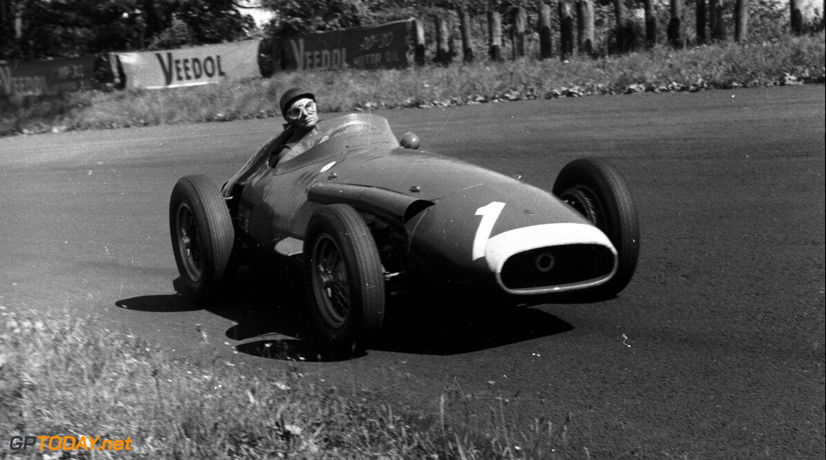 Juan Manuel Fangio al volante della Maserati 250 F in azione sul circuito del Nurburgring, domenica 4 agosto 1957.
Con questa vittoria Juan Manuel Fangio si aggiudic&#xf2; il Mondiale Piloti.
GP di Germania