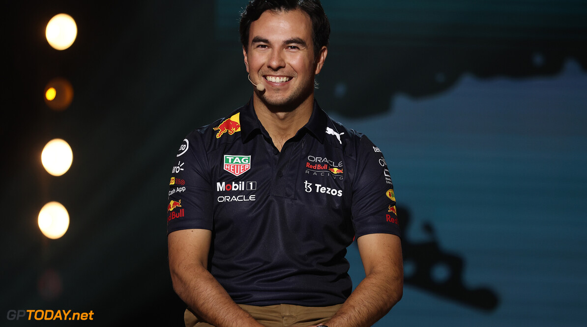 MILTON KEYNES, ENGLAND - JANUARY 26: Sergio Perez of Mexico and Red Bull Racing talks on stage during the Red Bull Racing RB18 launch at Red Bull Racing Factory on January 26, 2022 in Milton Keynes, England. (Photo by Bryn Lennon/Getty Images) // SI202202090252 // Usage for editorial use only // 
Red Bull Racing RB18 Launch




SI202202090252