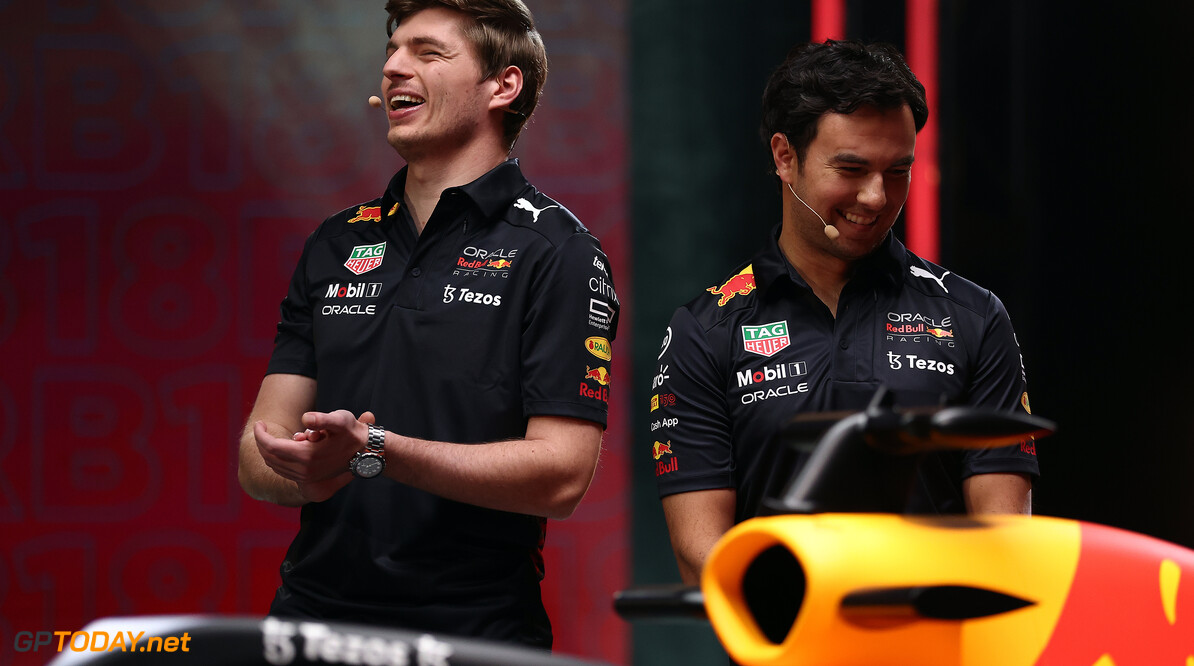MILTON KEYNES, ENGLAND - JANUARY 26: Max Verstappen of Netherlands and Red Bull Racing and Sergio Perez of Mexico and Red Bull Racing talk on stage during the Red Bull Racing RB18 launch at Red Bull Racing Factory on January 26, 2022 in Milton Keynes, England. (Photo by Bryn Lennon/Getty Images) // SI202202090255 // Usage for editorial use only // 
Red Bull Racing RB18 Launch




SI202202090255