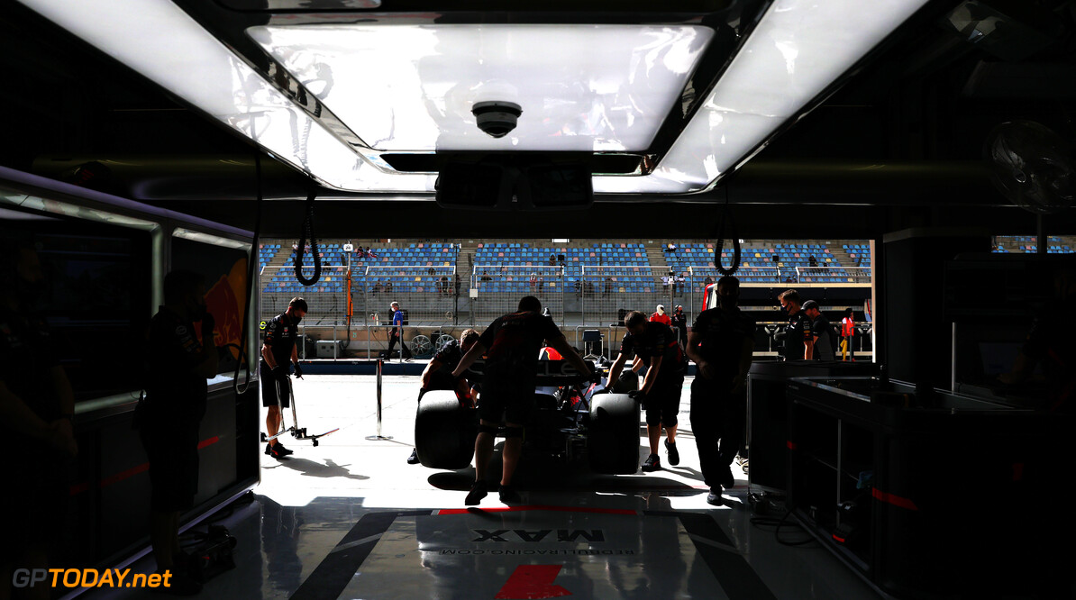 BAHRAIN, BAHRAIN - MARCH 12: Sergio Perez of Mexico driving the (11) Oracle Red Bull Racing RB18 is pulled back into the garage during Day Three of F1 Testing at Bahrain International Circuit on March 12, 2022 in Bahrain, Bahrain. (Photo by Mark Thompson/Getty Images) // Getty Images / Red Bull Content Pool // SI202203120087 // Usage for editorial use only // 
Formula 1 Testing in Bahrain - Day 3




SI202203120087
