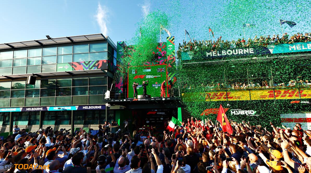 MELBOURNE, AUSTRALIA - APRIL 10: Race winner Charles Leclerc of Monaco and Ferrari, Second placed Sergio Perez of Mexico and Oracle Red Bull Racing and Third placed George Russell of Great Britain and Mercedes celebrate on the podium during the F1 Grand Prix of Australia at Melbourne Grand Prix Circuit on April 10, 2022 in Melbourne, Australia. (Photo by Mark Thompson/Getty Images) // Getty Images / Red Bull Content Pool // SI202204100212 // Usage for editorial use only // 
F1 Grand Prix of Australia




SI202204100212
