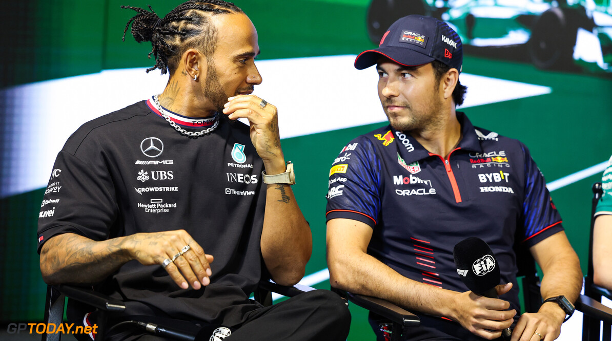 Formula One World Championship
(L to R): Lewis Hamilton (GBR) Mercedes AMG F1 with Sergio Perez (MEX) Red Bull Racing, in the FIA Press Conference.

16.03.2023. Formula 1 World Championship, Rd 2, Saudi Arabian Grand Prix, Jeddah, Saudi Arabia, Preparation Day.

- www.xpbimages.com, EMail: requests@xpbimages.com (C) Copyright: XPB Images
Motor Racing - Formula One World Championship - Saudi Arabian Grand Prix - Preparation Day - Jeddah, Saudi Arabia
XPB Images
Jeddah
Saudi Arabia