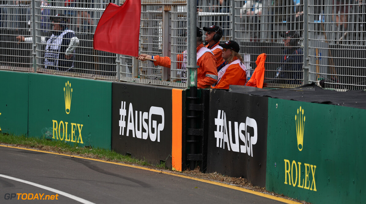 Formula One World Championship
Marshal waves a red flad during practice.

01.04.2023. Formula 1 World Championship, Rd 3, Australian Grand Prix, Albert Park, Melbourne, Australia, Qualifying Day.

- www.xpbimages.com, EMail: requests@xpbimages.com (C) Copyright: Moy / XPB Images
Motor Racing - Formula One World Championship - Australian Grand Prix - Qualifying Day - Melbourne, Australia
xpbimages.com
Melbourne
Australia