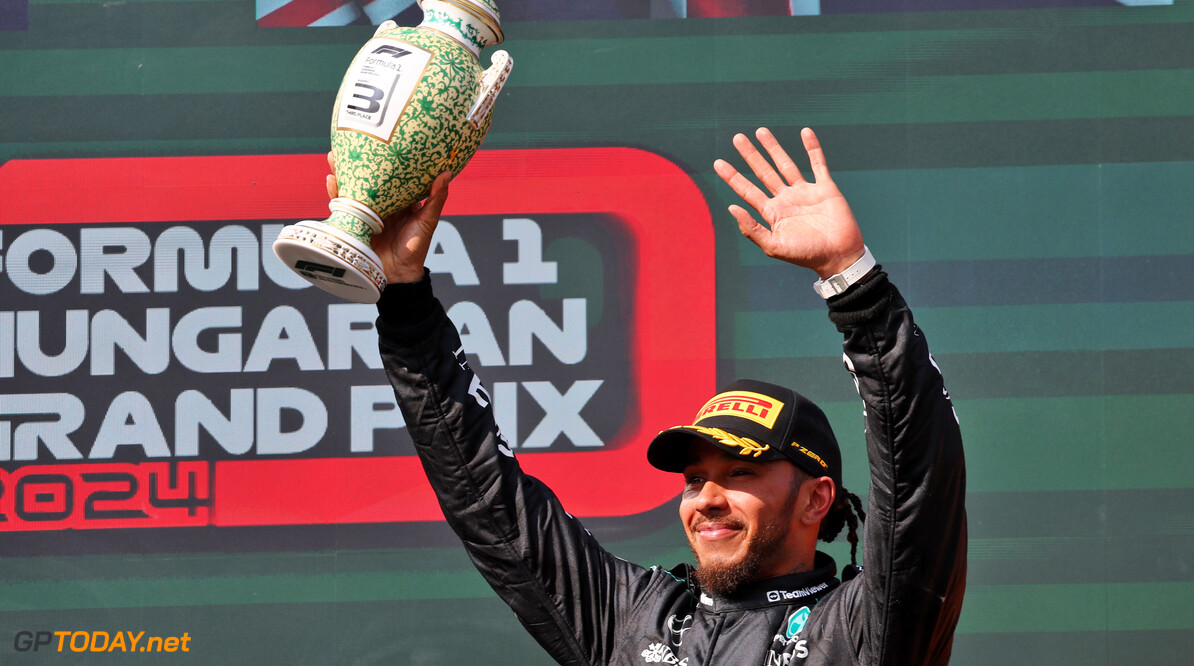 Formula One World Championship
Lewis Hamilton (GBR) Mercedes AMG F1 celebrates his third position on the podium.

21.07.2024. Formula 1 World Championship, Rd 13, Hungarian Grand Prix, Budapest, Hungary, Race Day.

- www.xpbimages.com, EMail: requests@xpbimages.com (C) Copyright: Batchelor / XPB Images
Motor Racing - Formula One World Championship - Hungarian Grand Prix - Race Day - Budapest, Hungary
XPB Images
Budapest
Hungary

Formel1 Formel F1 Formula 1 Formula1 GP Grand Prix one Circuit H