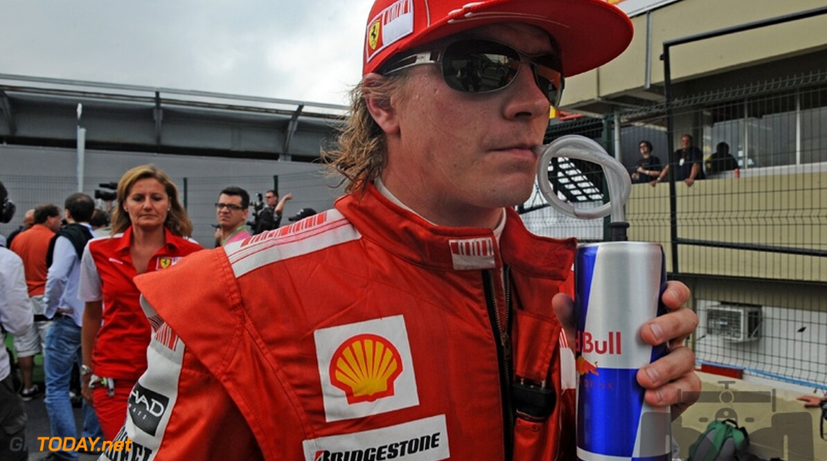 'Kimi Raikkonen in 2011 naast Vettel bij Red Bull Racing'