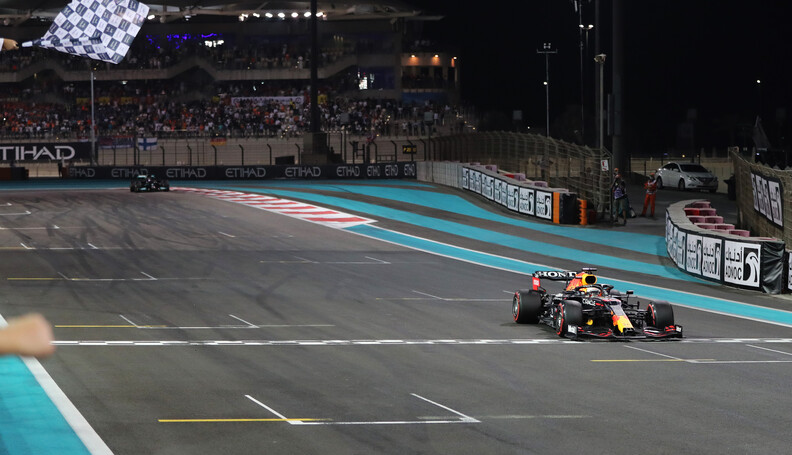 ABU DHABI, UNITED ARAB EMIRATES - DECEMBER 12: Race winner Max Verstappen of the Netherlands driving the (33) Red Bull Racing RB16B Honda takes the chequered flag during the F1 Grand Prix of Abu Dhabi at Yas Marina Circuit on December 12, 2021 in Abu Dhabi, United Arab Emirates. (Photo by Kamran Jebreili - Pool/Getty Images) // Getty Images / Red Bull Content Pool  // SI202112120257 // Usage for editorial use only // 
F1 Grand Prix of Abu Dhabi




SI202112120257