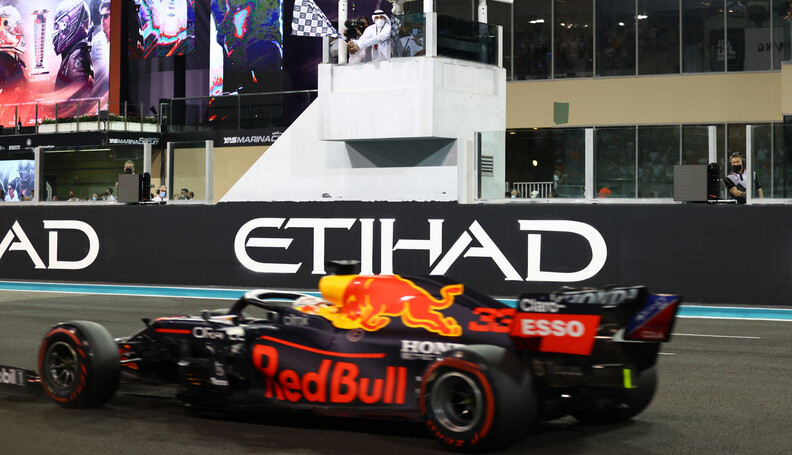 ABU DHABI, UNITED ARAB EMIRATES - DECEMBER 12: Race winner Max Verstappen of the Netherlands driving the (33) Red Bull Racing RB16B Honda takes the chequered flag during the F1 Grand Prix of Abu Dhabi at Yas Marina Circuit on December 12, 2021 in Abu Dhabi, United Arab Emirates. (Photo by Bryn Lennon/Getty Images) // Getty Images / Red Bull Content Pool  // SI202112120536 // Usage for editorial use only // 
F1 Grand Prix of Abu Dhabi




SI202112120536